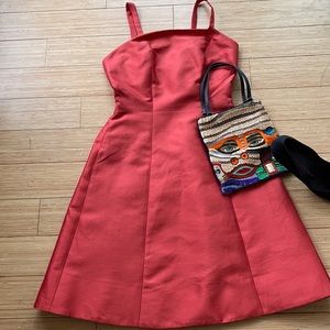 PRADA Showstopper Coral. Stand out amounts f